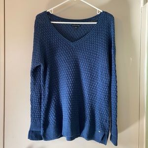 A v neck cable knit sweater